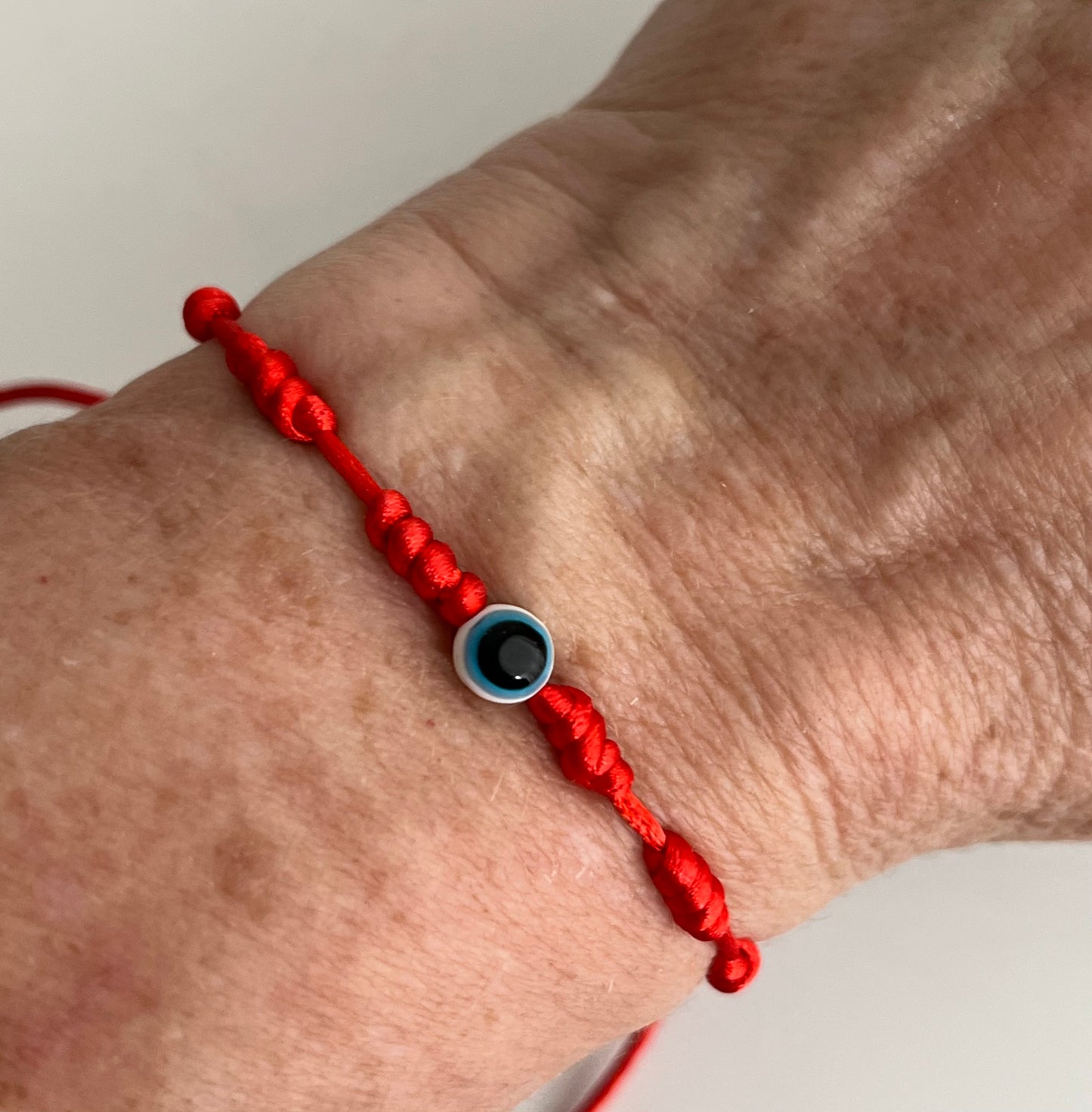 Pulseira 7 Nós com olho grego
