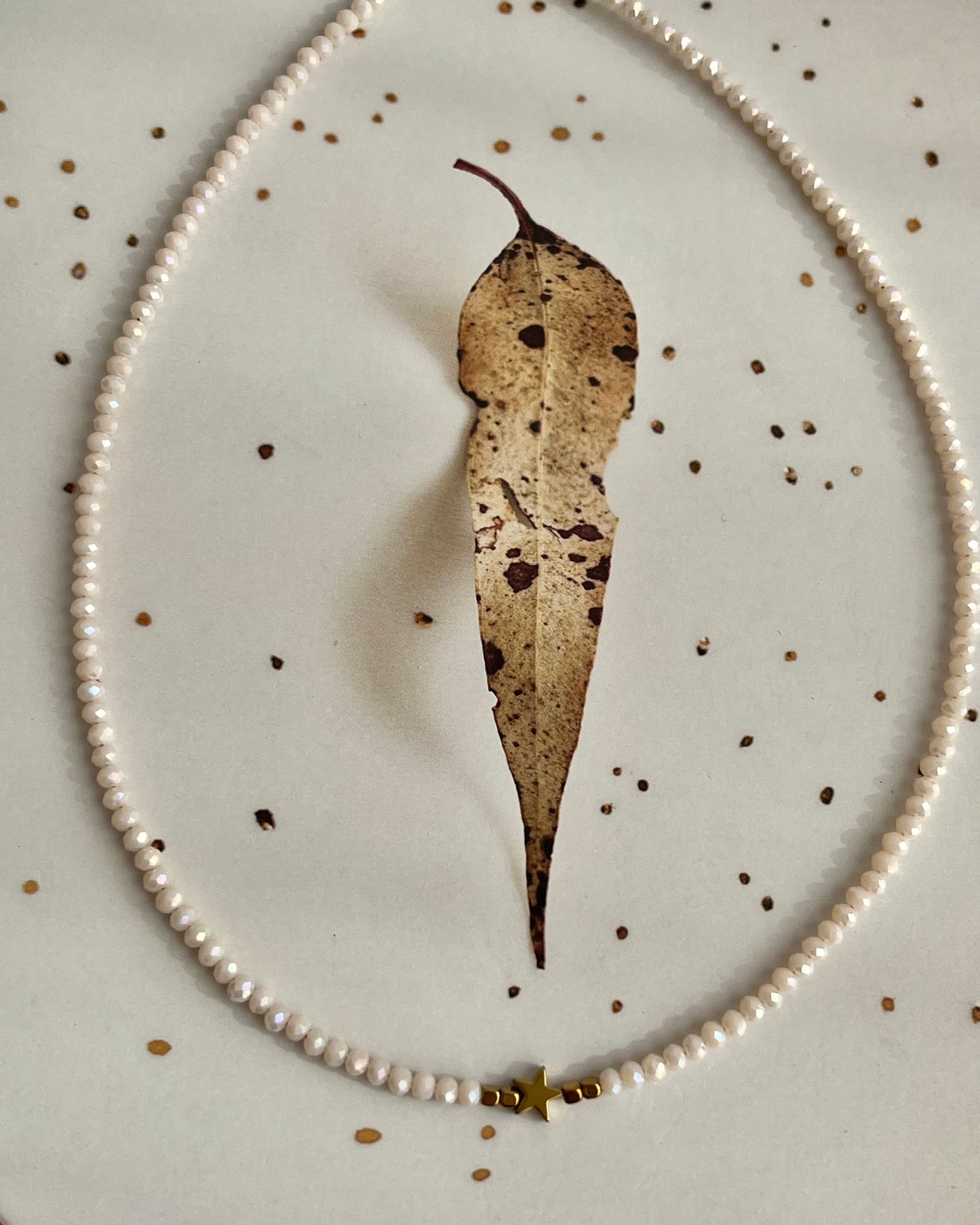 Chocker cristal off-white com estrela