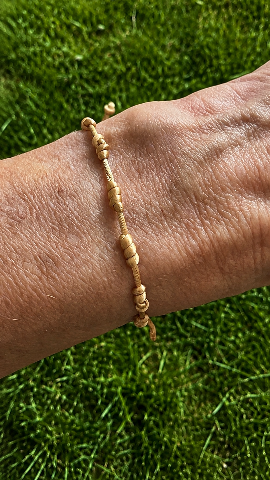 Pulseira 7 Nós Dourada